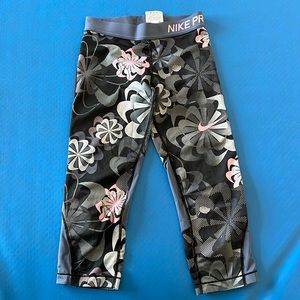 Nike pro, dry fit, girls, Capri leggings size medium. Black, gray, pink &blue